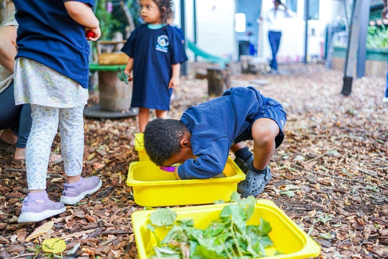 Children enjoying outdoor play at Blue Nest Pinner Green