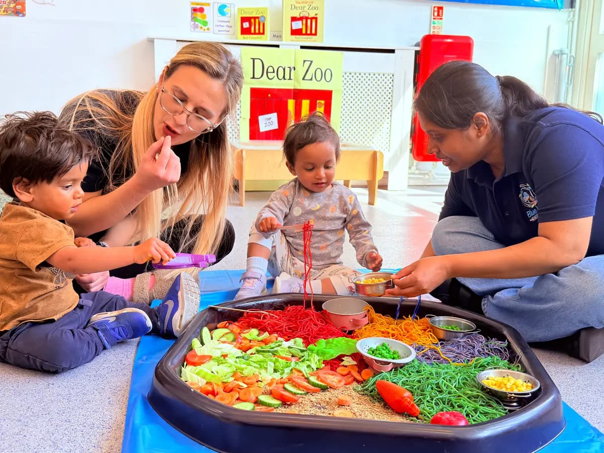 Children sharing fresh, healthy meals at Blue Nest Montessori Harrow